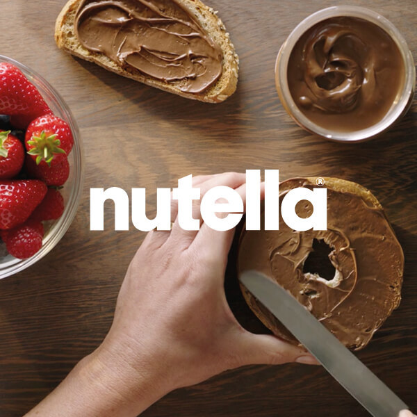 Nutella Logo With Strawberries And A Bagel