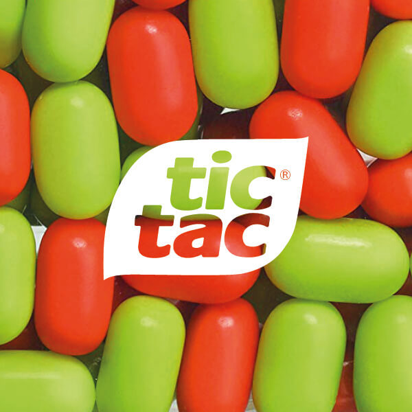 Tic Tac Logo On A Background Of Sweets